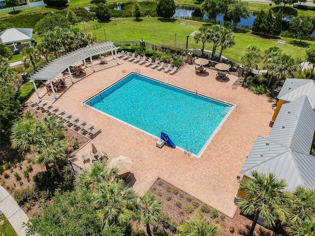 view of pool featuring a pergola, a patio, and a water view