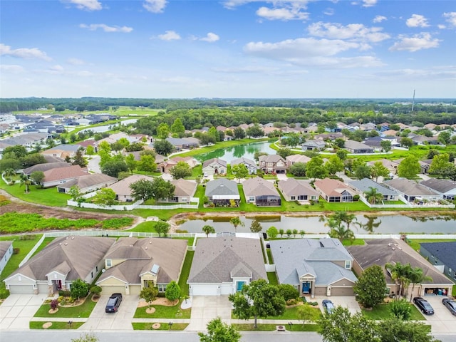 6843 Boulder Run Loop, Wesley Chapel, FL 33545 - aerial perspective of suburban area with a large body of water