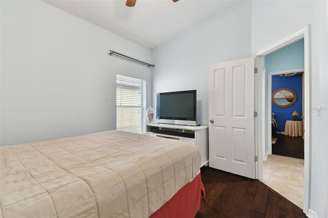 6843 Boulder Run Loop, Wesley Chapel, FL 33545 - bedroom with dark wood finished floors, high vaulted ceiling, and a ceiling fan