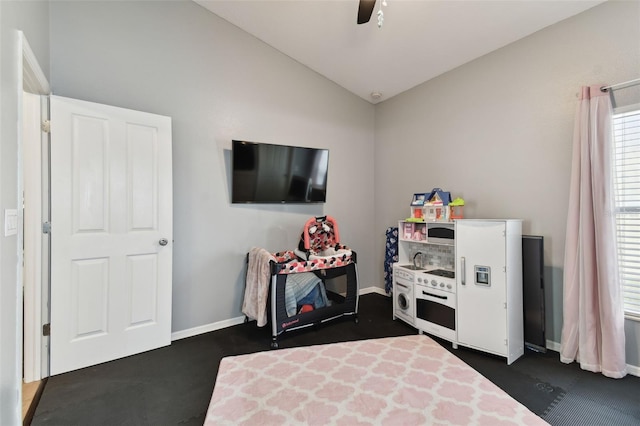 6843 Boulder Run Loop, Wesley Chapel, FL 33545 - bedroom featuring vaulted ceiling, baseboards, ceiling fan, and dark carpet