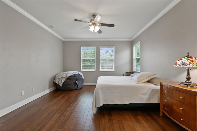 bedroom featuring ceiling fan, dark wood-type flooring, and ornamental molding