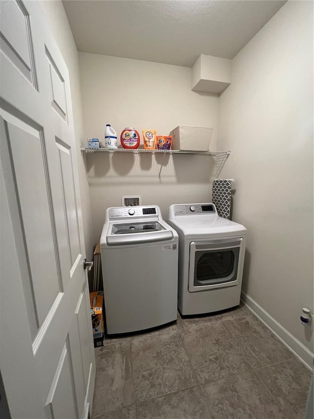 laundry area with washer and dryer