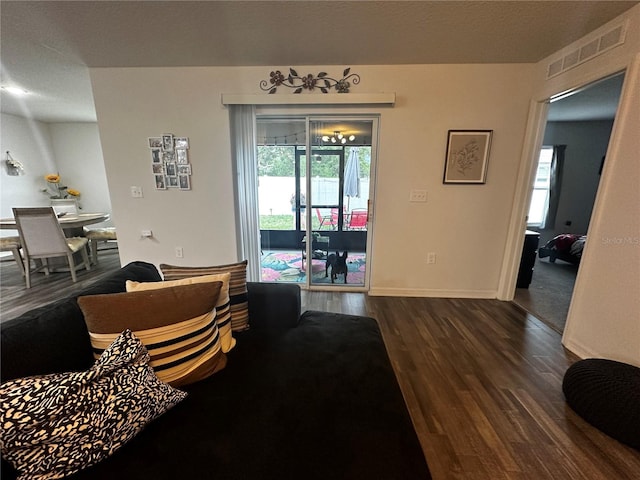 living room featuring dark hardwood / wood-style floors