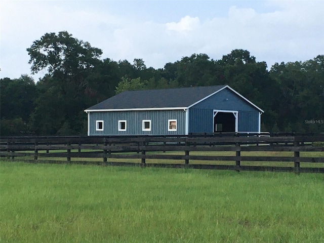 exterior space with a rural view