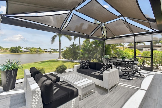 view of patio / terrace with an outdoor hangout area and a water view