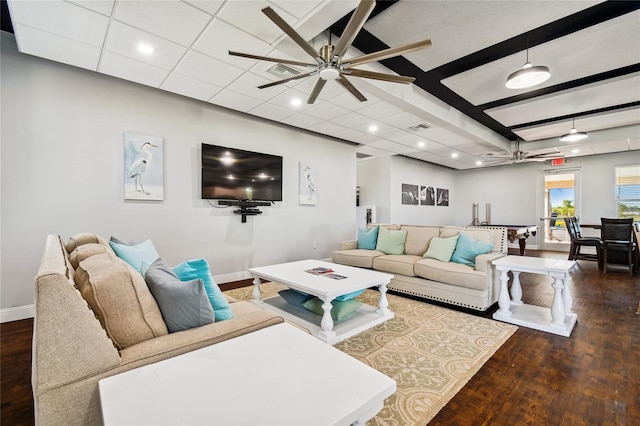 living room featuring beamed ceiling, dark hardwood / wood-style flooring, and ceiling fan