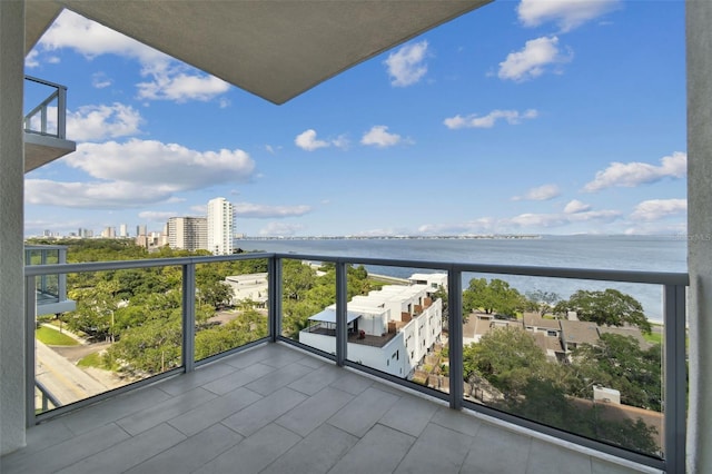 balcony featuring a water view