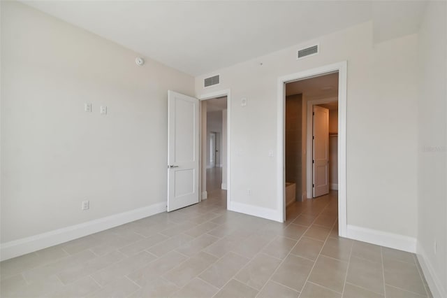 view of tiled spare room