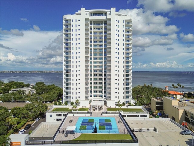 view of building exterior with a water view