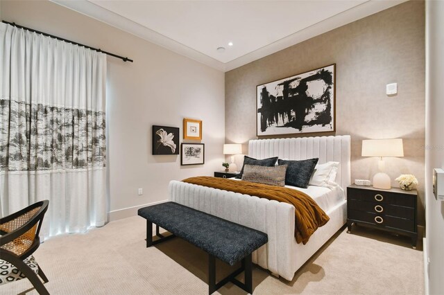 bedroom with light carpet and crown molding