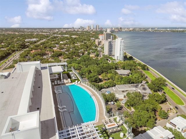 birds eye view of property with a water view