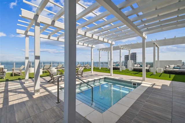 view of pool with outdoor lounge area, a pergola, a patio area, an in ground hot tub, and a water view