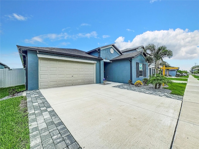 view of front of home featuring a garage