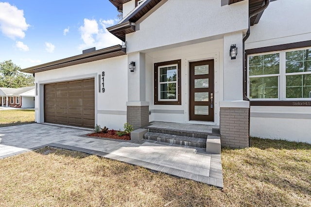 entrance to property featuring a garage