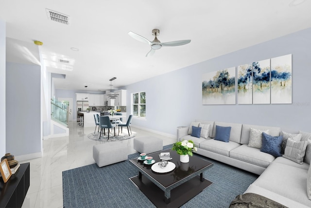 living room featuring ceiling fan