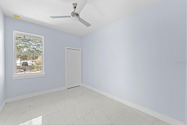 empty room with ceiling fan