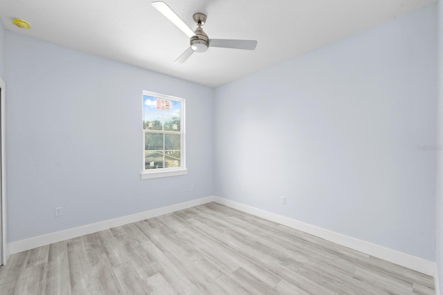 unfurnished room with ceiling fan and light hardwood / wood-style flooring