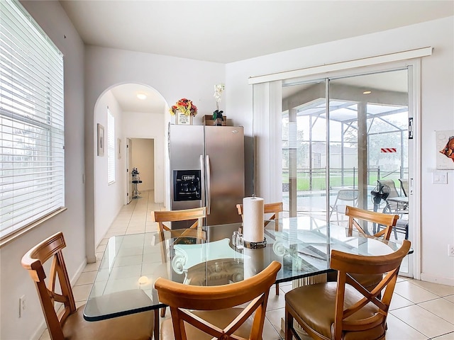 dining room with light tile patterned flooring