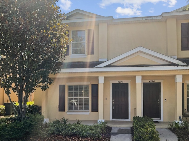 view of front of house featuring covered porch and central AC