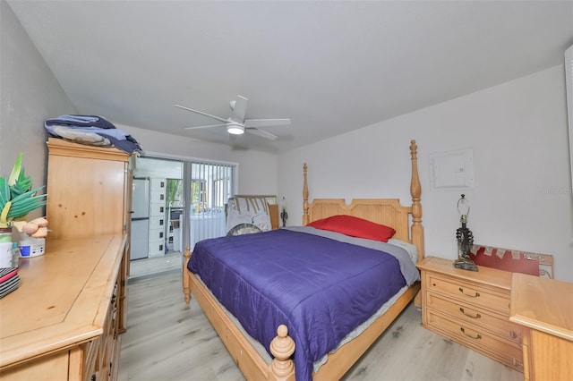 bedroom with access to exterior, ceiling fan, and light wood-type flooring