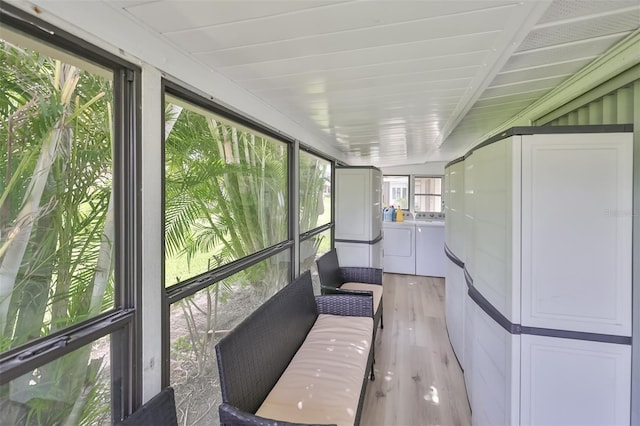 sunroom / solarium with washing machine and dryer