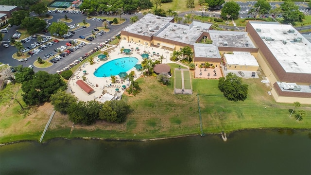 birds eye view of property featuring a water view