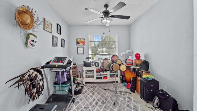 interior space featuring ceiling fan