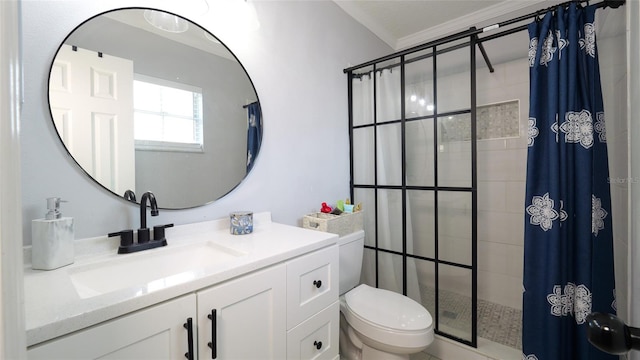 bathroom featuring curtained shower, ornamental molding, vanity, and toilet