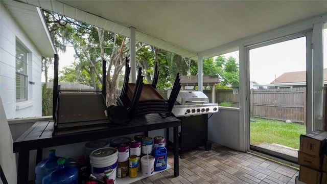 sunroom / solarium featuring a wealth of natural light