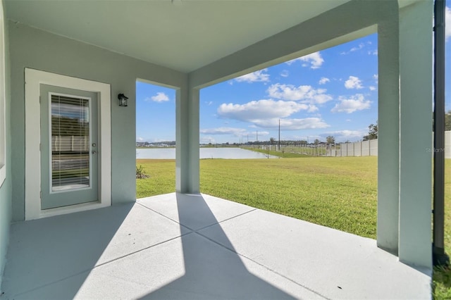 view of patio / terrace with a water view