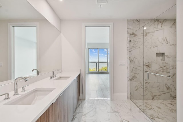 bathroom with vanity and an enclosed shower