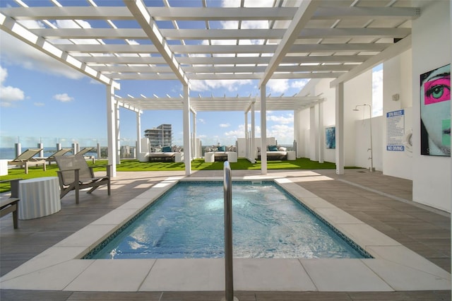 view of swimming pool with a pergola, an outdoor living space, and a patio