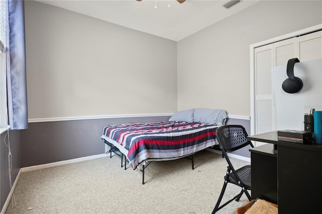 bedroom featuring carpet and ceiling fan