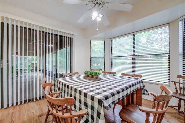 dining area featuring hardwood / wood-style flooring and ceiling fan