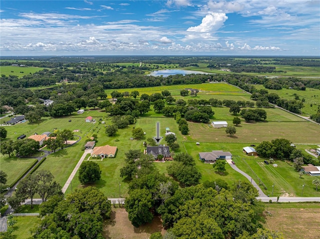 aerial view featuring a rural view and a water view