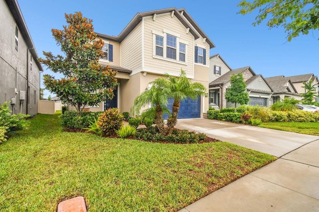 view of front of home featuring a garage and a front lawn