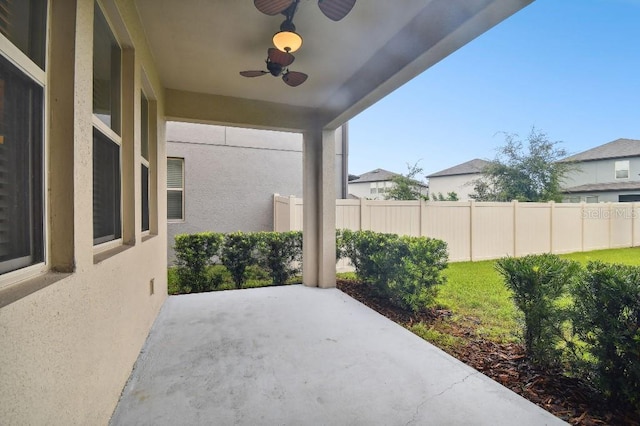 view of patio / terrace featuring ceiling fan