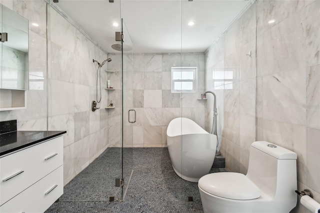 full bathroom with vanity, toilet, independent shower and bath, and tile walls