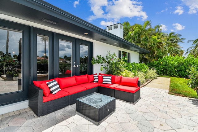 view of patio / terrace featuring an outdoor living space and french doors