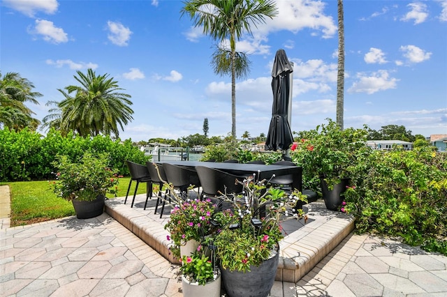 view of patio / terrace featuring an outdoor bar