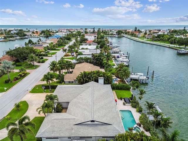 drone / aerial view with a water view