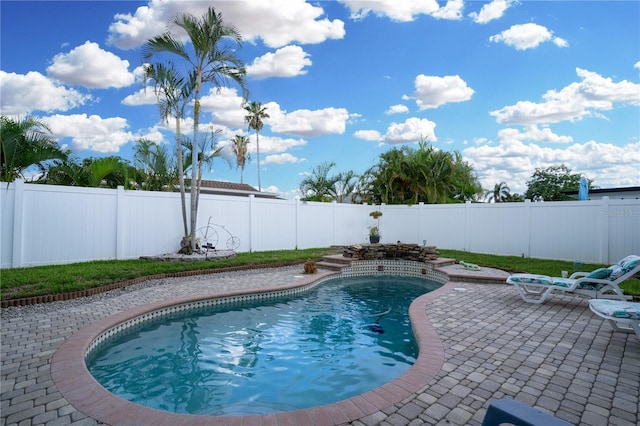 view of pool with a patio area