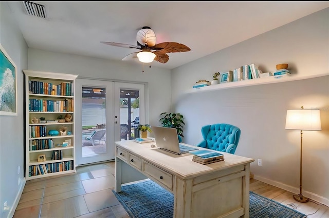 office space featuring ceiling fan and french doors