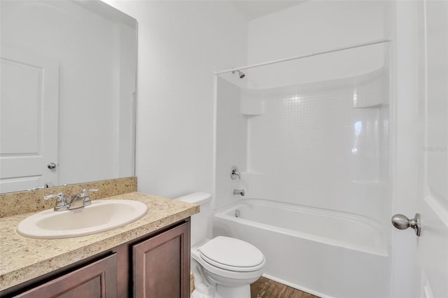 full bathroom featuring vanity, shower / washtub combination, and toilet