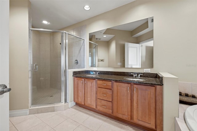 bathroom with separate shower and tub, tile patterned flooring, and vanity