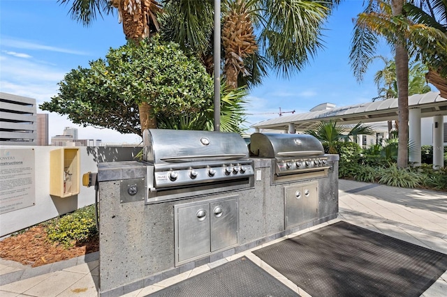 view of patio / terrace with an outdoor kitchen and grilling area