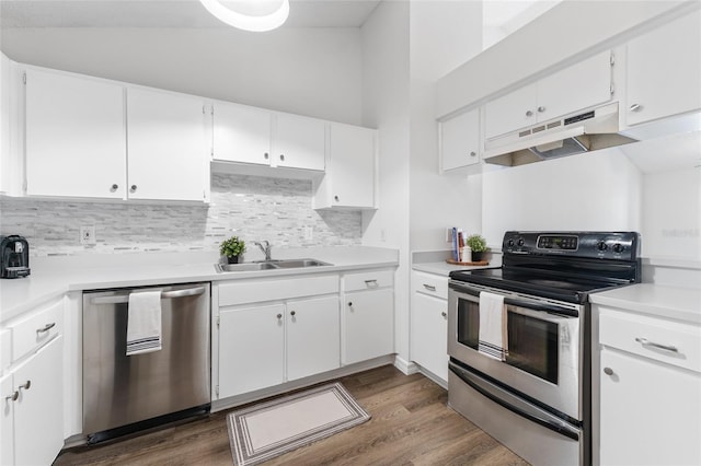 kitchen with white cabinets, sink, and appliances with stainless steel finishes