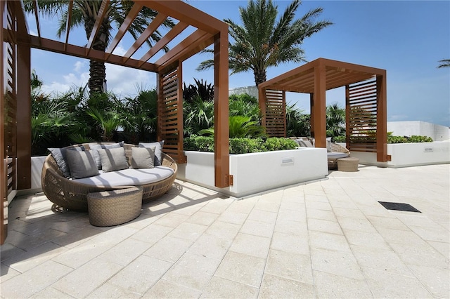 view of patio with a pergola and an outdoor hangout area