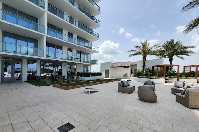 view of property's community featuring an outdoor living space