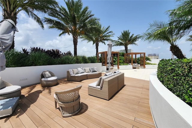 wooden deck featuring an outdoor living space